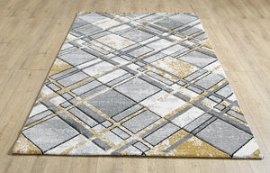 Geometric patterned rug on a wooden floor