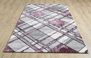 Accra Rug Geometric patterned rug on a wooden floor