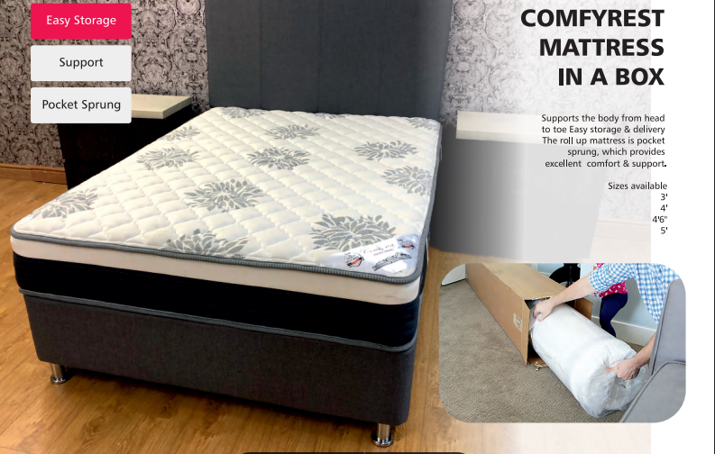 A mattress on a bed with a patterned white and black cover. There is a tag on the mattress that reads 'Comfy Rest Mattress in a box'.