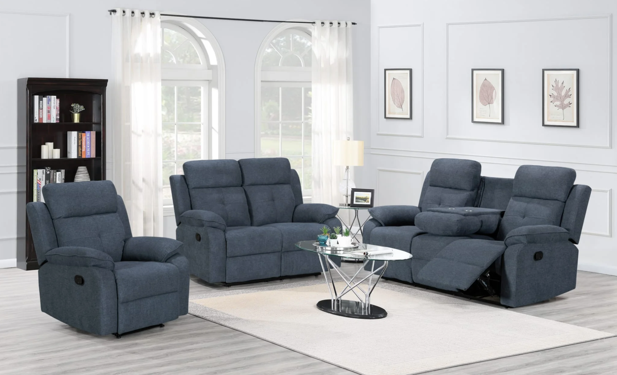 Gray reclining sofa set in a living room with white walls and decor.