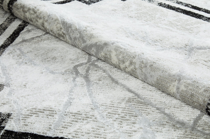 Textured fabric with a pattern of black lines on a white background