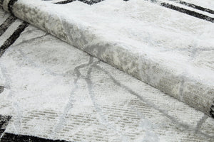 Textured fabric with a pattern of black lines on a white background