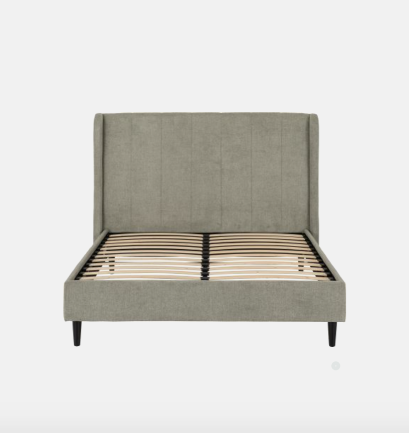 Gray upholstered bed frame on a white background