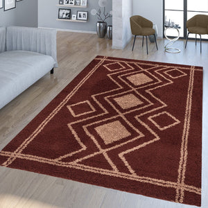Burgundy geometric patterned rug in a living room setting with furniture and decor.