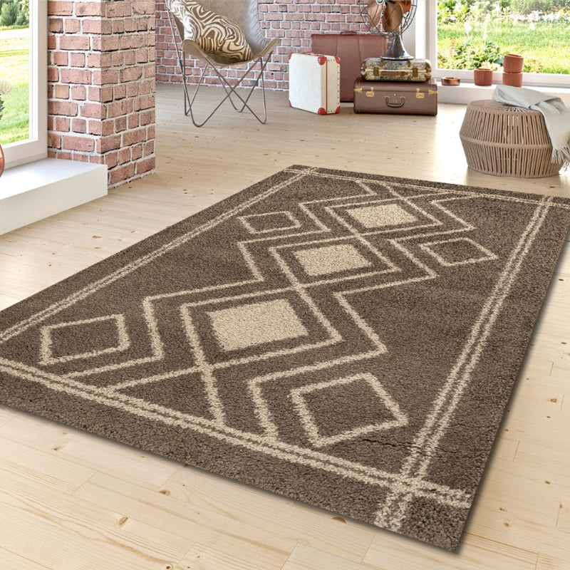 Patterned rug on a wooden floor with a living room setting