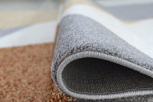 Grey, White and brown rug.