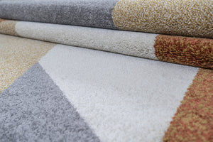 Grey, White and brown rug.