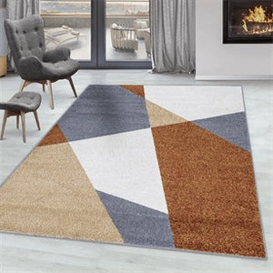 Grey, White and brown rug.