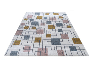 Patterned rug with geometric design on a white background