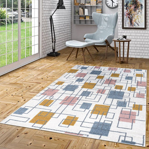 Geometric patterned rug on a wooden floor with a modern chair and decor in the background.