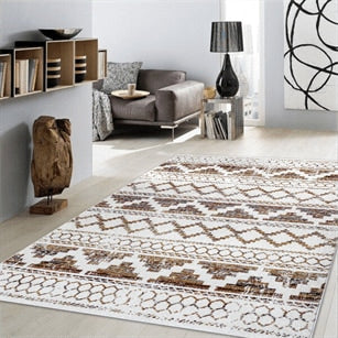 Living room with a patterned rug, sofa, and decorative items.