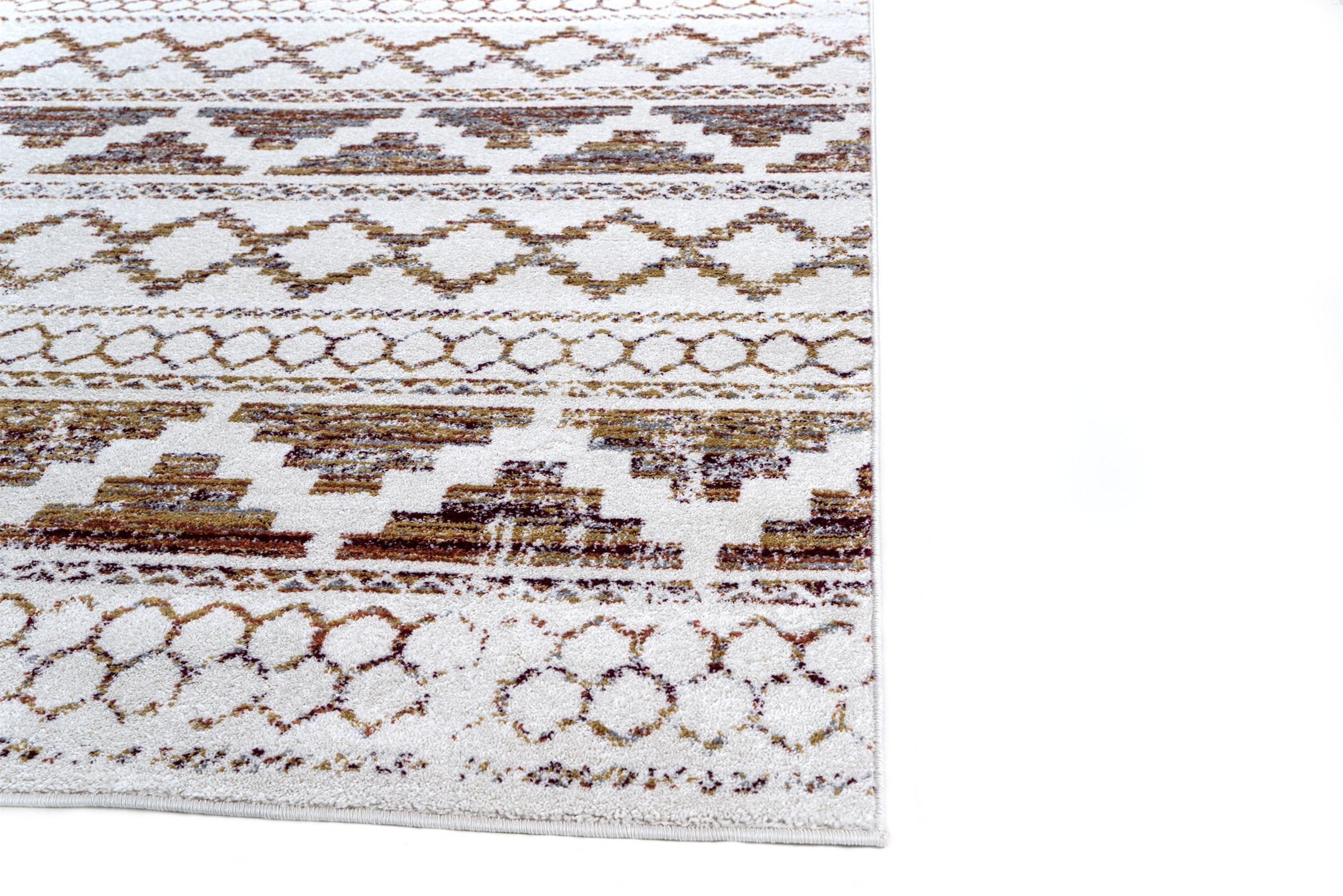 Patterned rug with geometric design on a white background