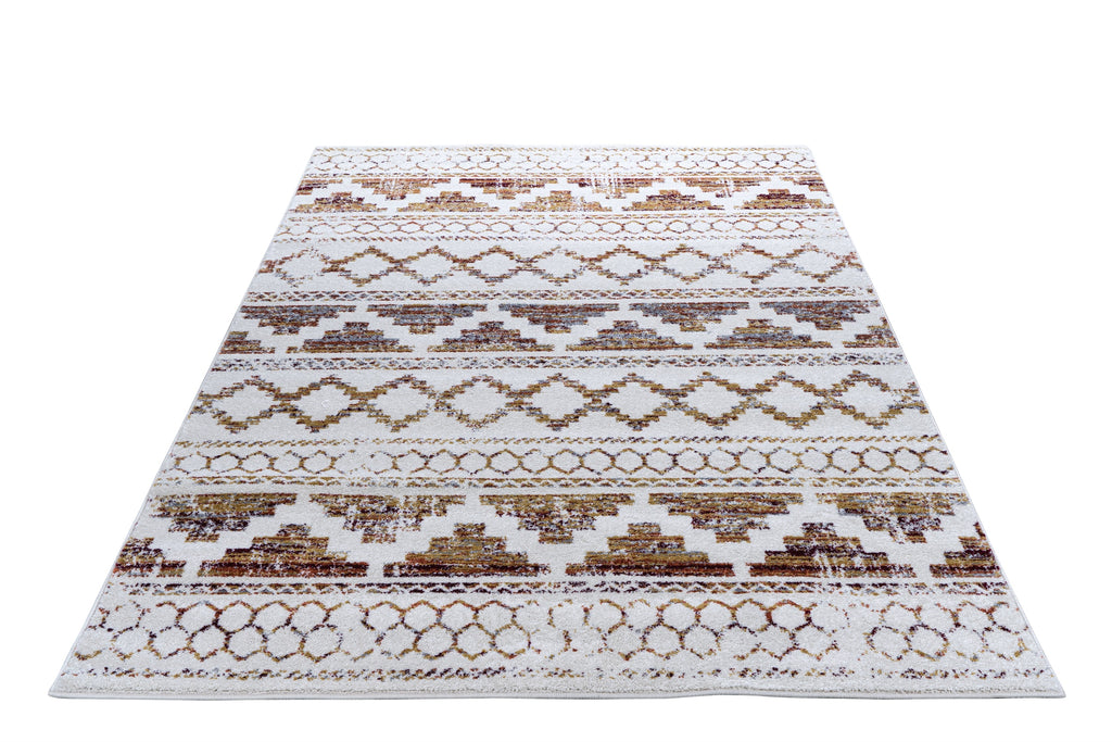 Patterned rug with brown and beige design on a white background