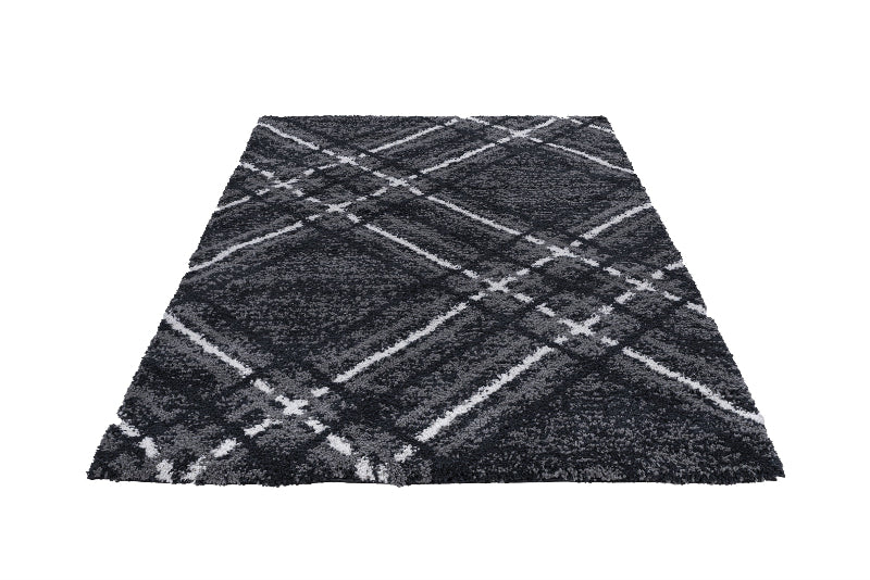 Black and white checkered rug on a white background