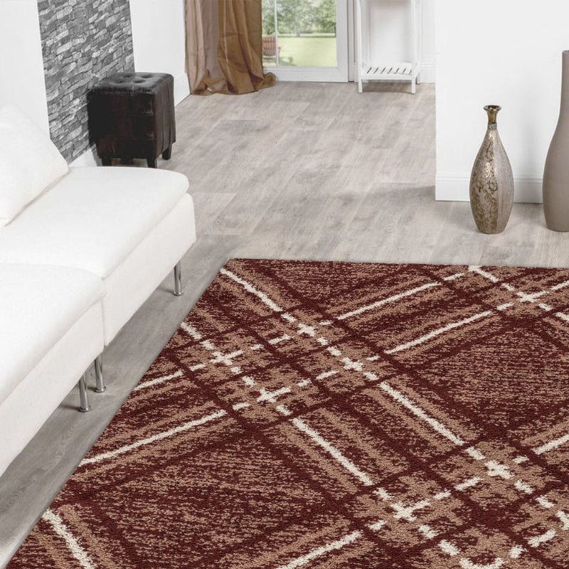 Living room with a brown checkered rug, white sofa, and decorative elements.