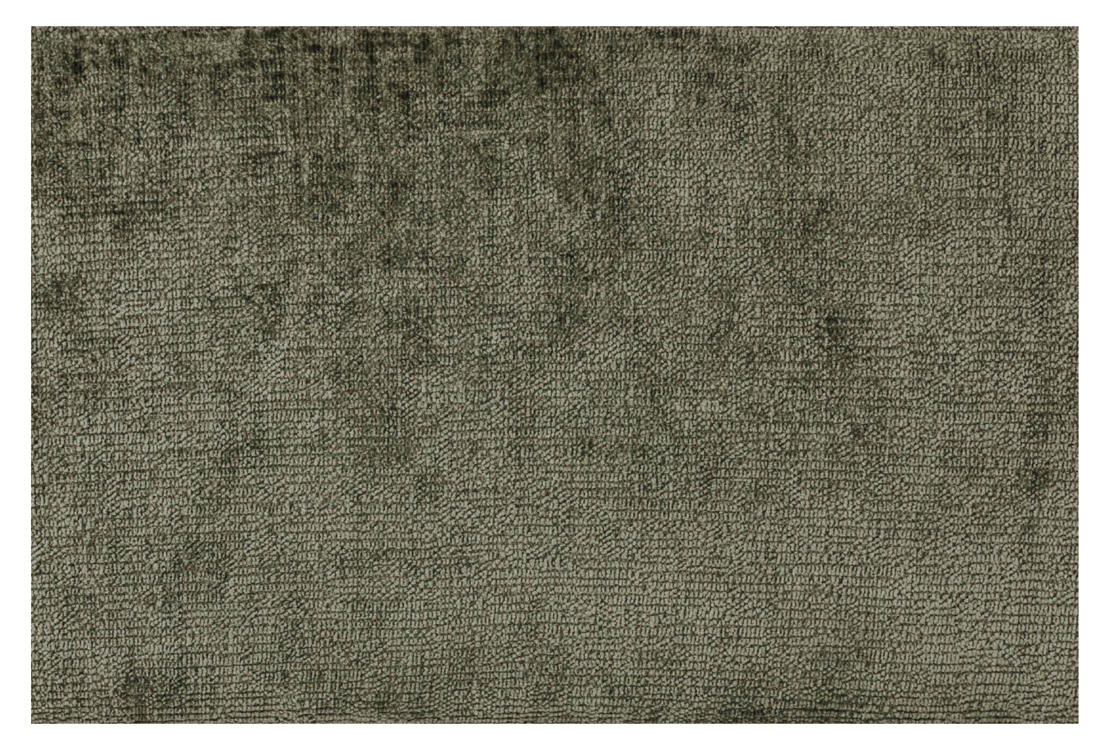 Textured green rug with a subtle pattern