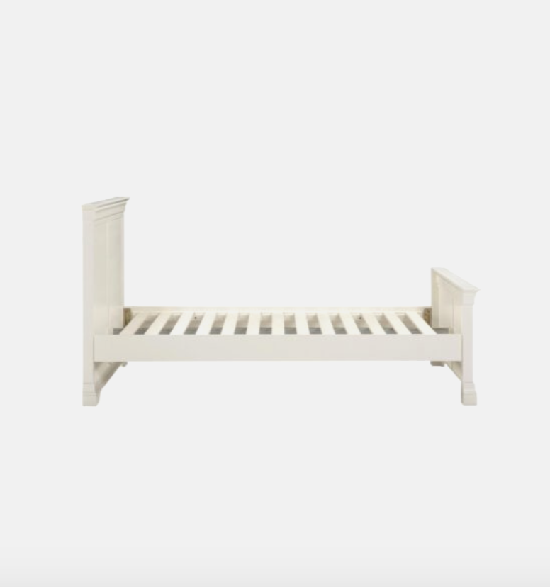 White wooden bed frame on a white background