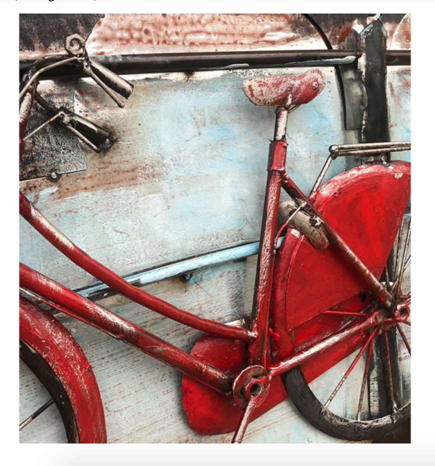 Red bicycle against a textured wall