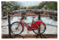 Painting of a red bicycle leaning against a wall with a bridge and trees in the background