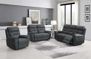 Gray reclining sofa set in a living room with decor elements.