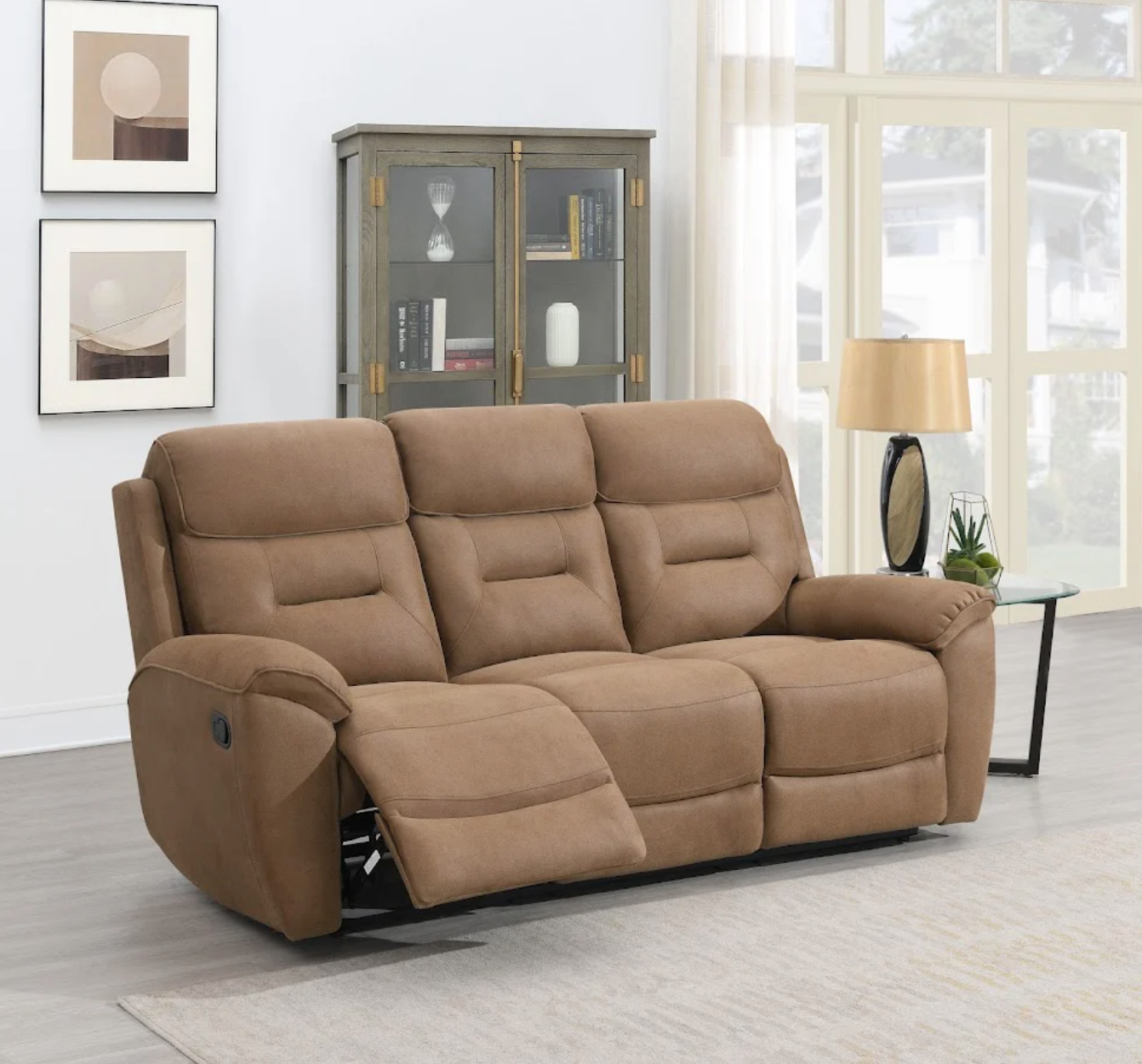 Brown reclining sofa in a living room setting with a lamp and cabinet.