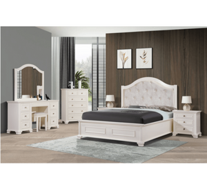 White bedroom furniture set with bed, dresser, mirror, and nightstands in a room.