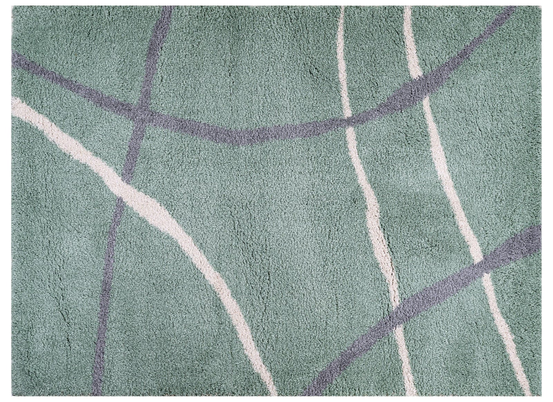 Green rug with white and purple lines on a plain background