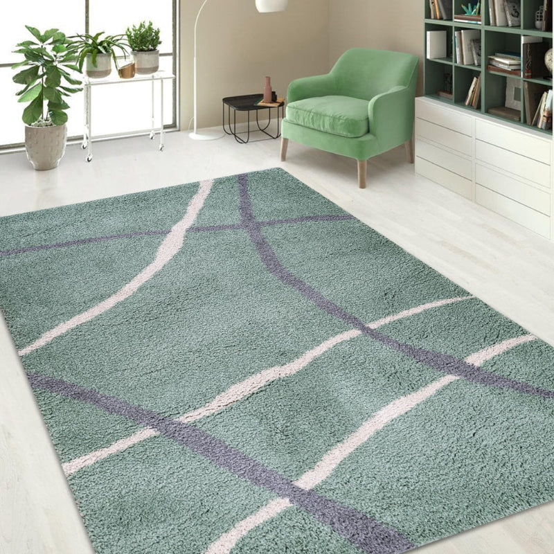 Green area rug with purple and white lines in a living room setting.
