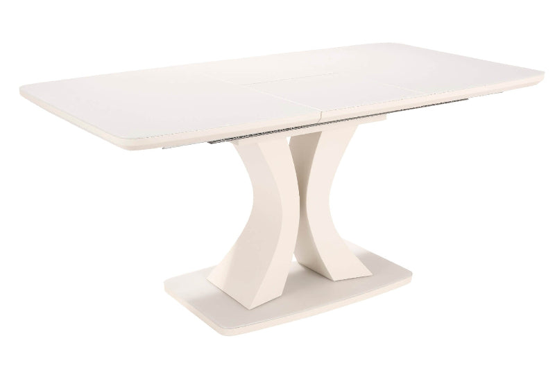 A white extending dining table with a tempered glass top and a metallic/white base.