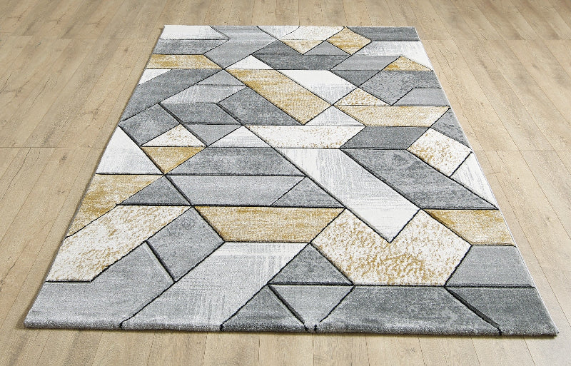 Geometric patterned rug on a wooden floor