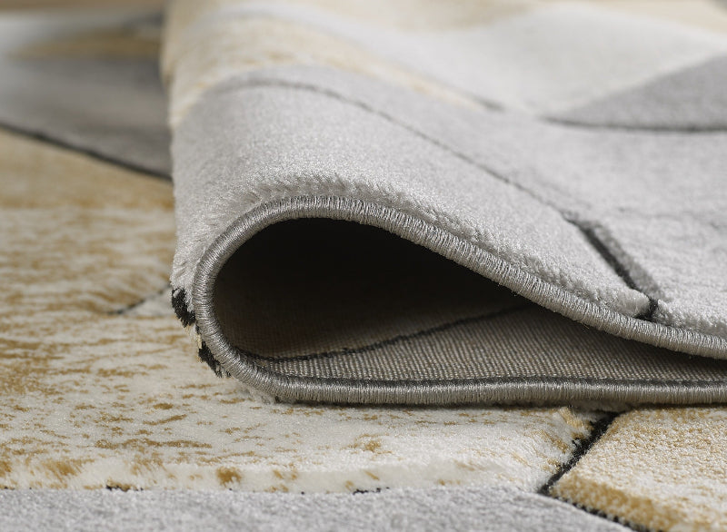 Gray rug on a wooden floor