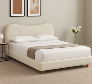 Donegal bed in beige teddy fleece fabric with grooved headboard and sturdy wooden feet.