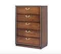 Wooden dresser with four drawers and gold handles on a white background