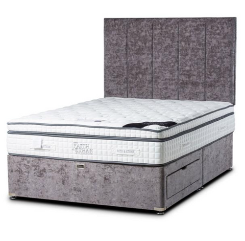 Gray upholstered bed with mattress on a white background