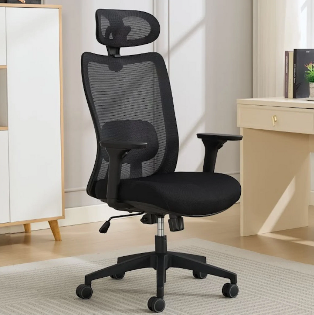 Black office chair with mesh back in a home office setting