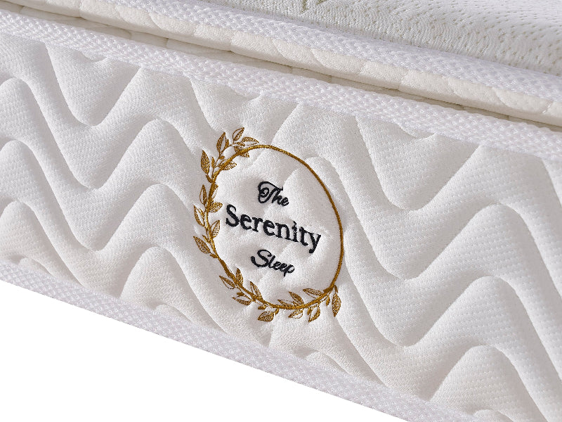 Mattress with 'The Serenity Sleep' logo on a white background