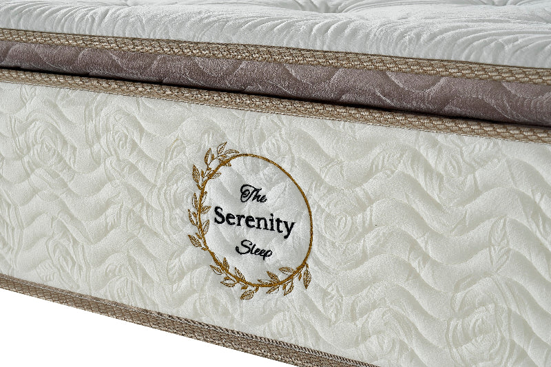 Mattress with 'The Serenity Sleep' logo on a white background