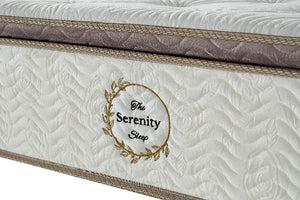 Mattress with 'The Serenity Sleep' logo on a white background