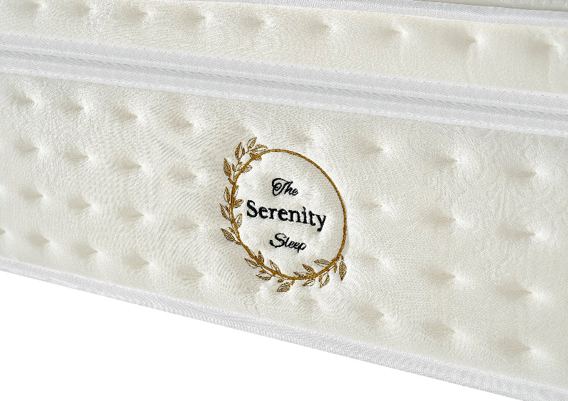 Mattress with 'The Serenity Sleep' logo on a white background