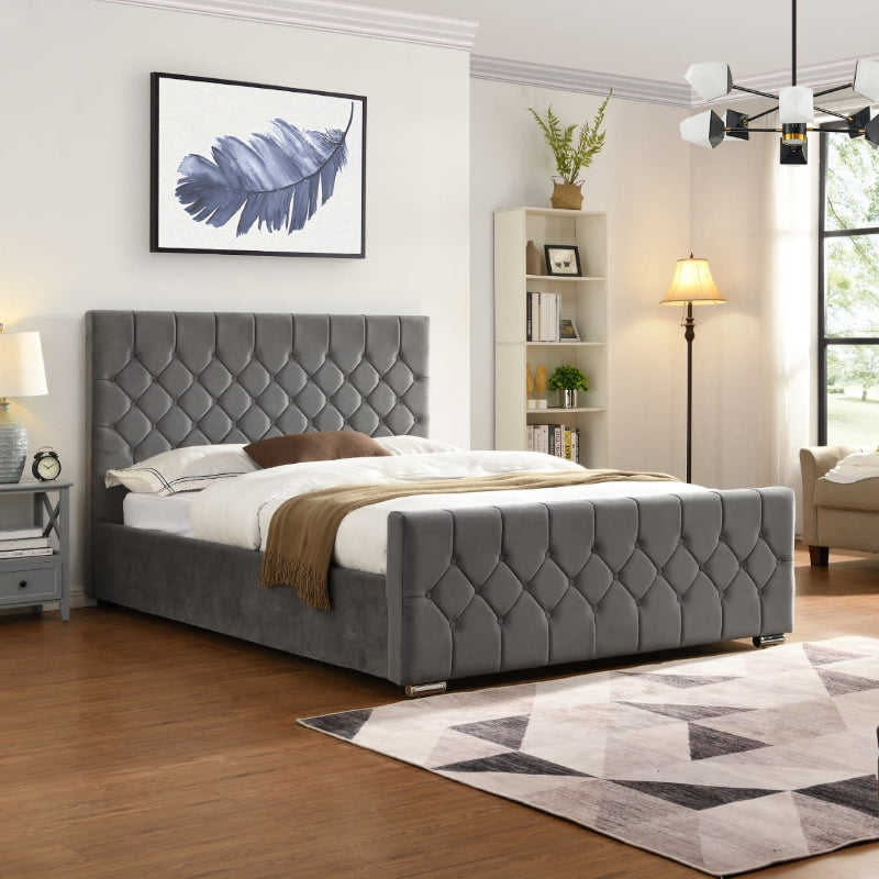 Grey upholstered bed in a modern bedroom with decor elements.
