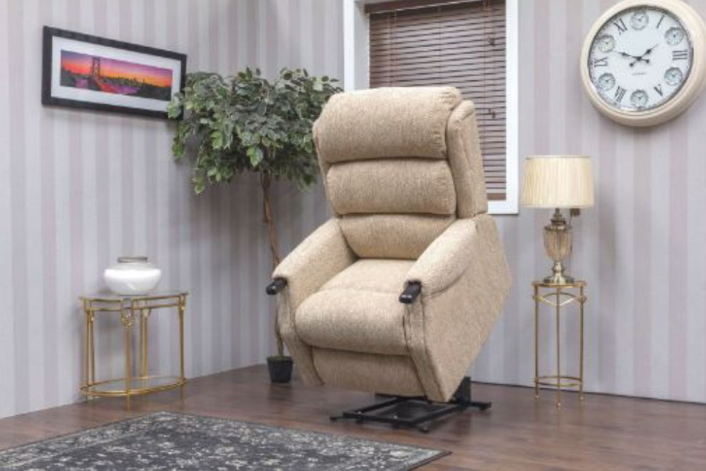 Beige recliner chair in a living room setting with decor elements.