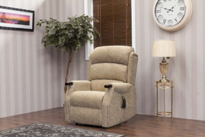 Beige recliner chair in a room with striped wallpaper, plant, and clock.
