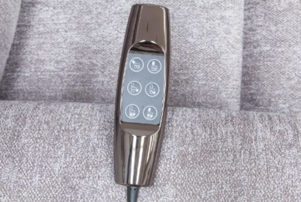 Control panel of a vacuum cleaner on a textured gray surface