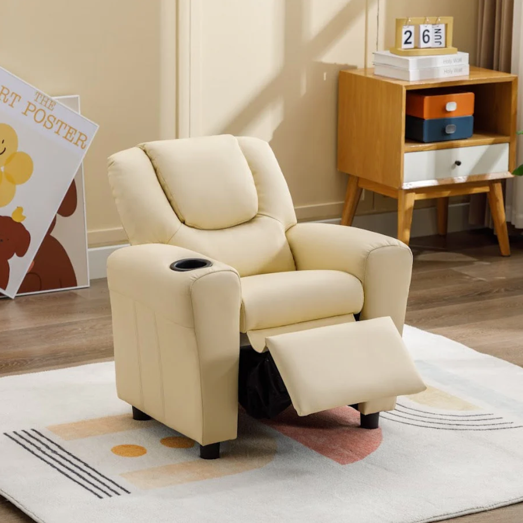 Beige recliner chair in a living room setting with a side table and decor items.