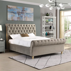 Mink upholstered bed in a bedroom with a abstract painting on the wall.