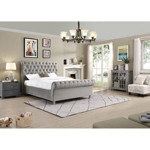 Modern bedroom with grey upholstered bed, nightstands, and armchair.