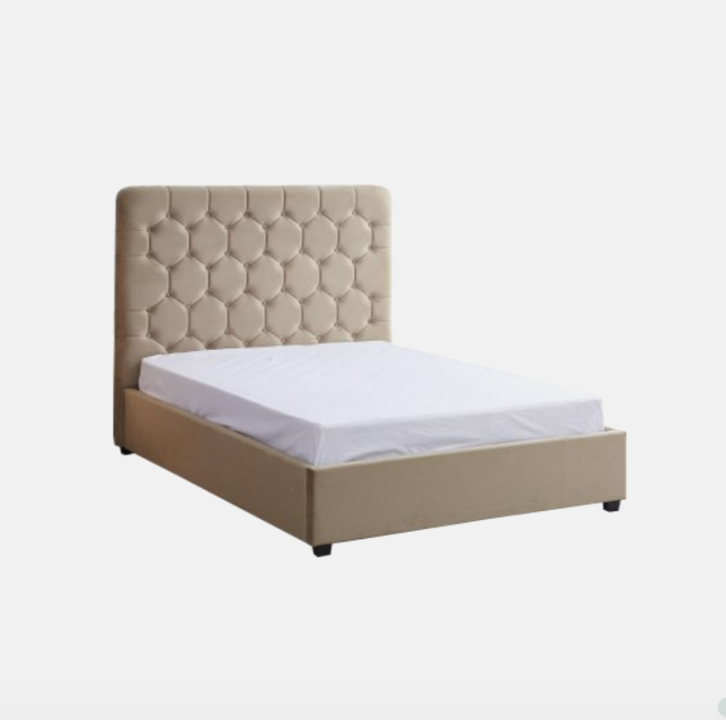 Beige upholstered bed with tufted headboard on a white background