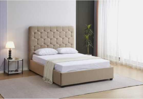 Beige upholstered bed with white bedding in a modern bedroom setting.
