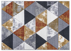 Geometric patterned rug with triangles in various colors on a white background