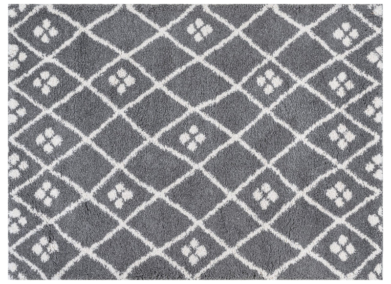 Grey and white geometric patterned rug